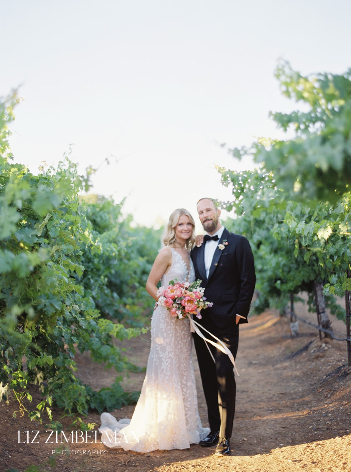 Bride and groom in vineyard