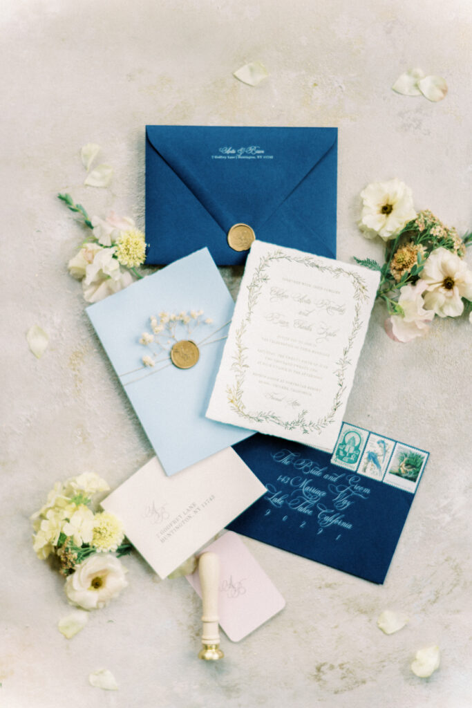 Blue wedding invitation flatlay